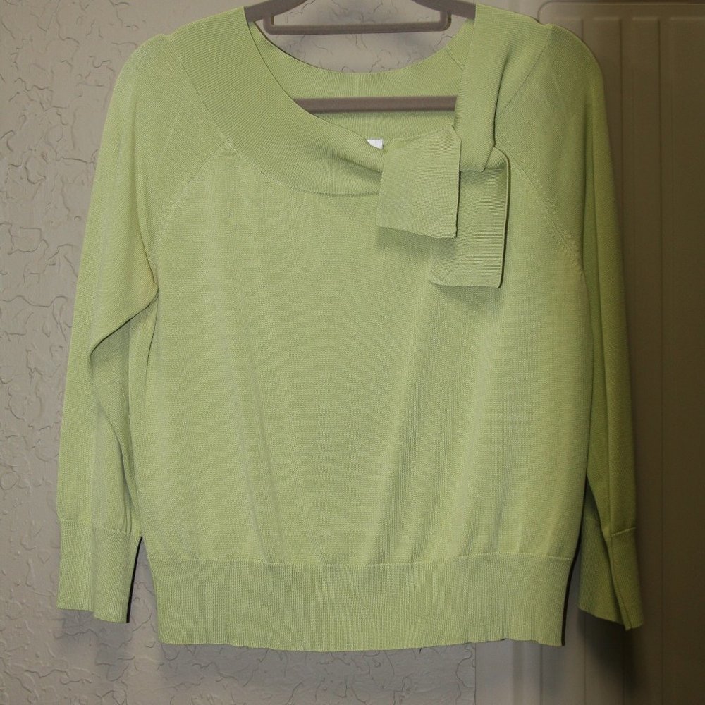 Key lime green silk sweater with tie detail at neck